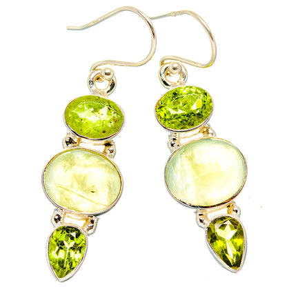 Sterling silver drop earrings with oval light stones and green oval/teardrop accents