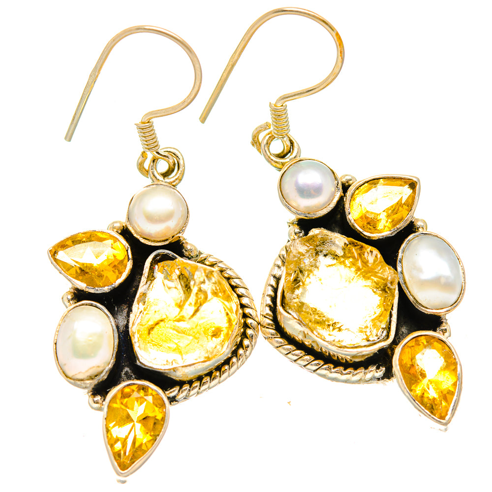 Drop earrings with citrine yellow stones, cultured pearls, and gold-tone hooks