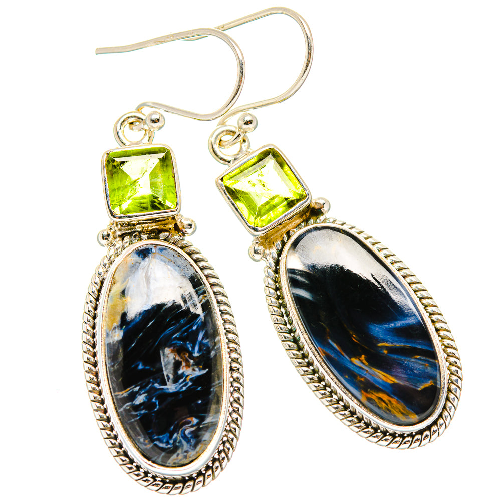 Pair of sterling silver dangle earrings with green square tops and oval blue pietersite stones