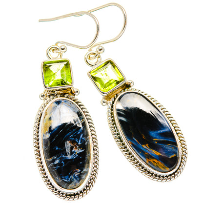 Pair of sterling silver dangle earrings with green square tops and oval blue pietersite stones