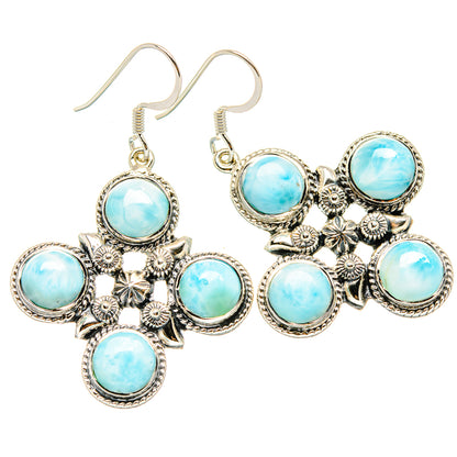 Sterling silver larimar cross earrings with six light-blue round stones