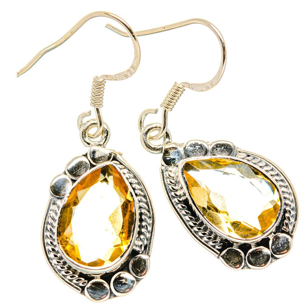 Oval faceted citrine earrings in 925 sterling silver with filigree bezel and dark stones