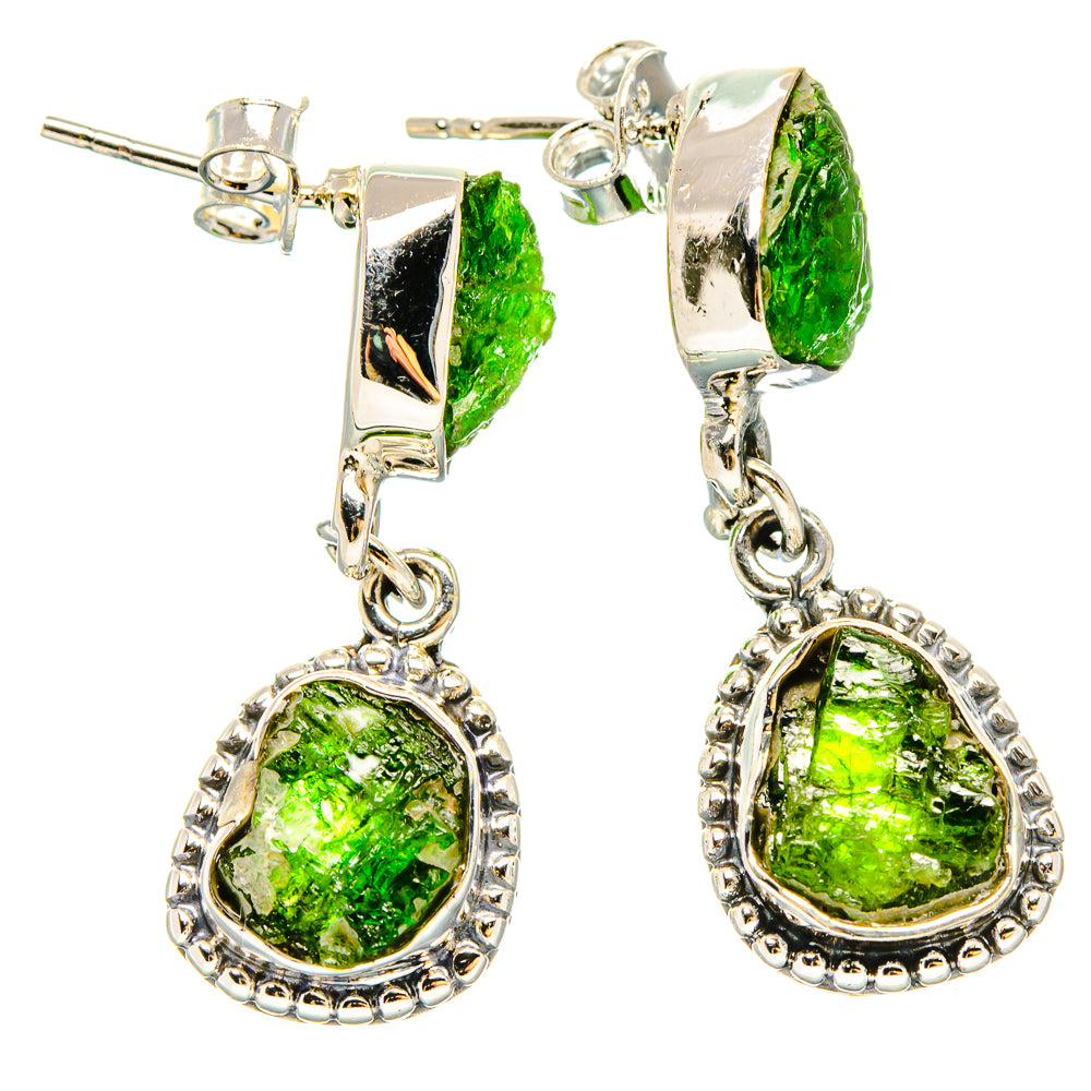 Silver dangle earrings with prong-set rough green stones, oval and teardrop shapes