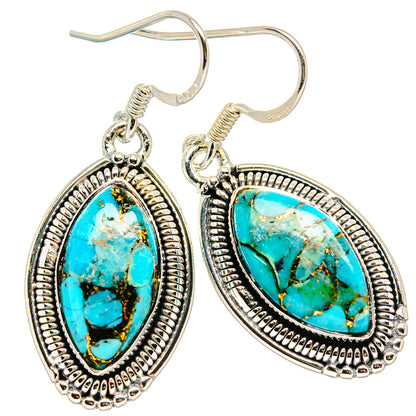 Turquoise oval drop earrings in sterling silver with ornate bezel and shepherd hooks