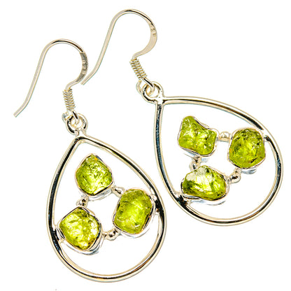 Sterling silver teardrop drop earrings with rough peridot green stones