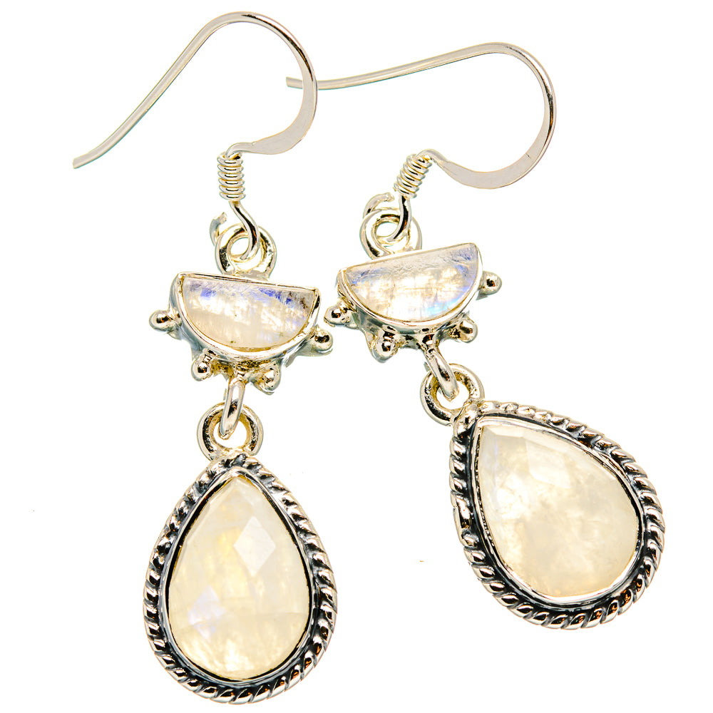 Sterling silver moonstone drop earrings with three teardrop dangles and ornate frames.