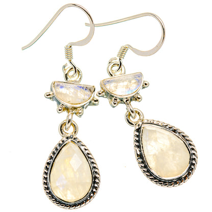 Sterling silver moonstone drop earrings with three teardrop dangles and ornate frames.