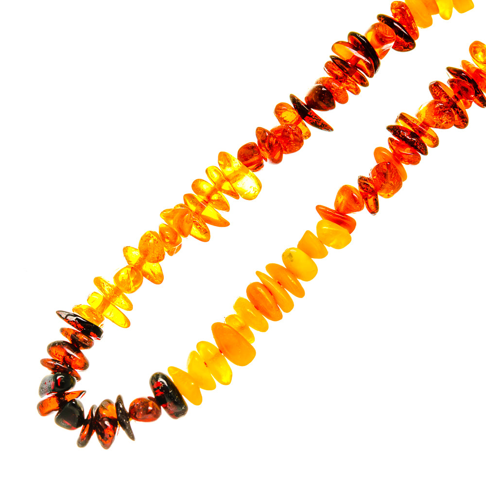 Baltic amber bead necklace with dark resin accents and multicolor orange stones