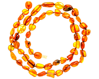 Amber bead necklace with warm orange oval Baltic stones