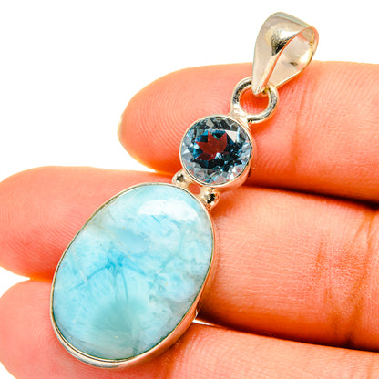 Light blue larimar oval and blue topaz round pendant on sterling silver bail