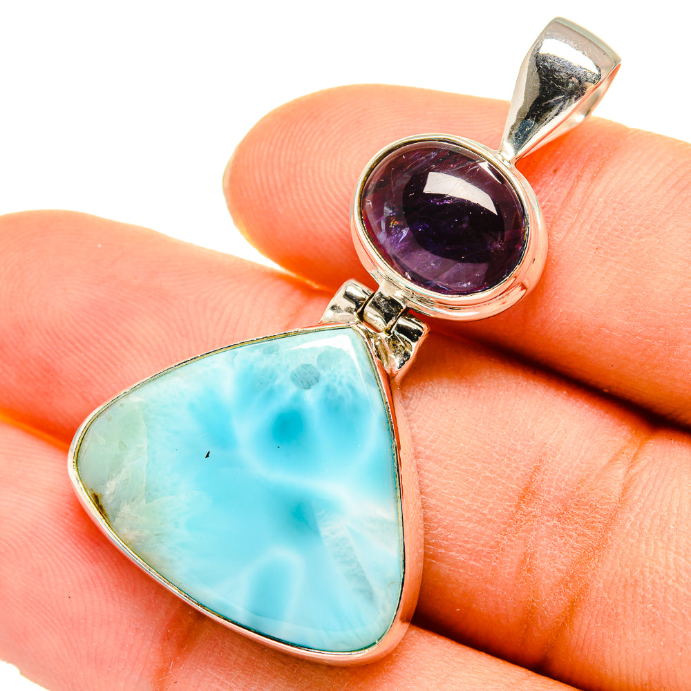 Sterling silver teardrop pendant with blue larimar-like stone and purple round accent