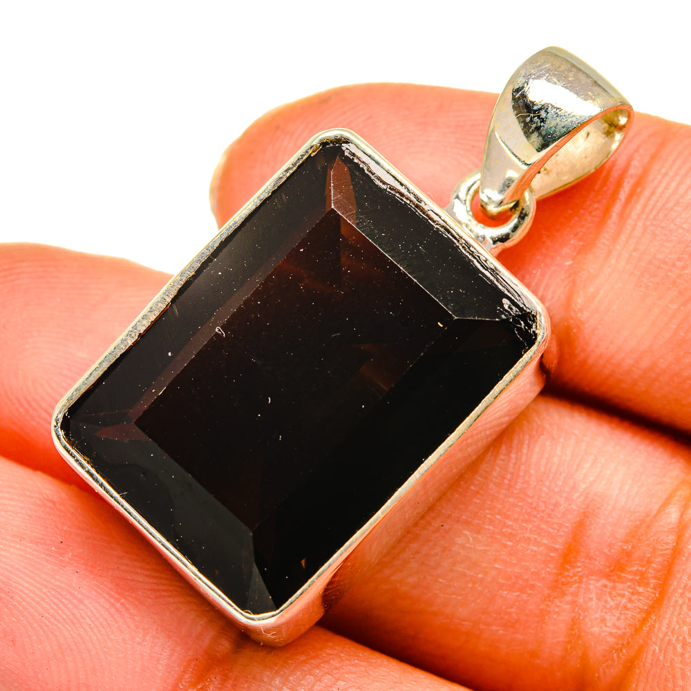 Sterling silver smoky quartz pendant close-up, dark faceted rectangular stone in bezel