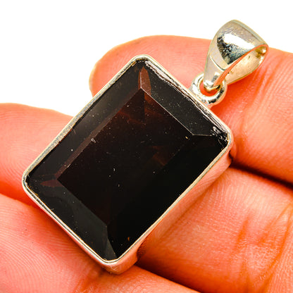 Sterling silver smoky quartz pendant close-up, dark faceted rectangular stone in bezel