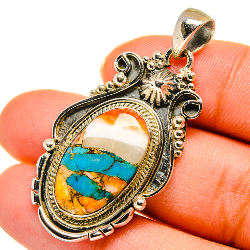 925 sterling silver pendant with oval turquoise, orange, and white inlay stone
