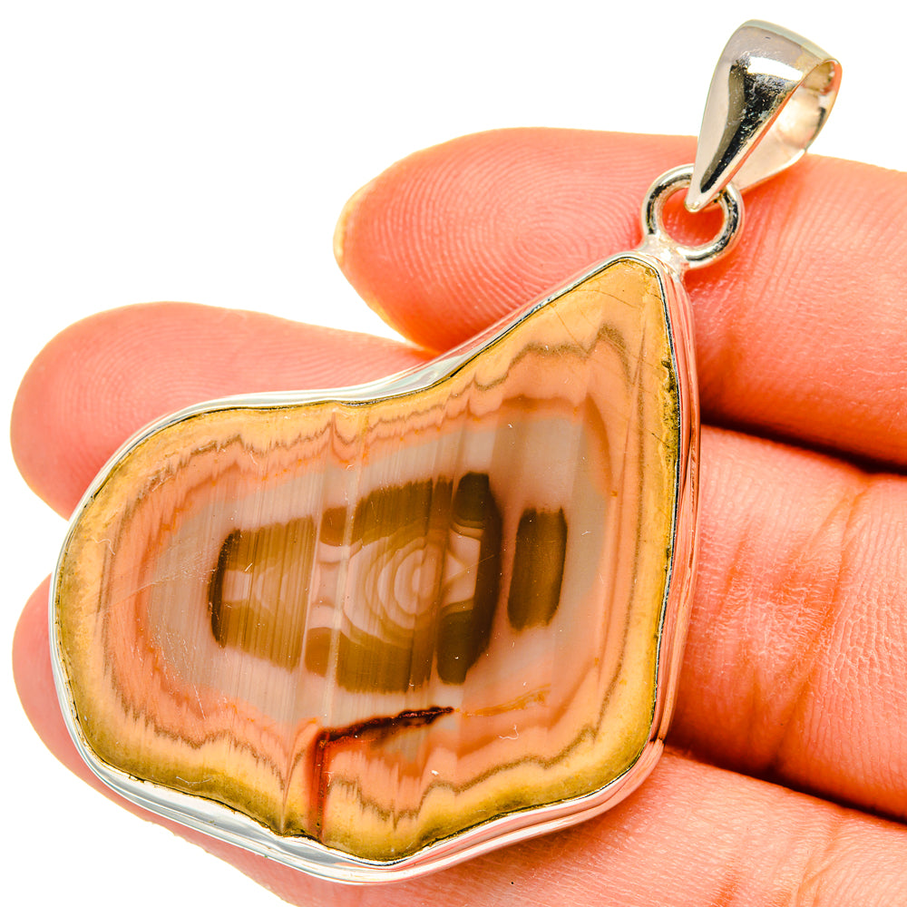 Orange jasper teardrop pendant with 925 sterling silver bail, close-up view