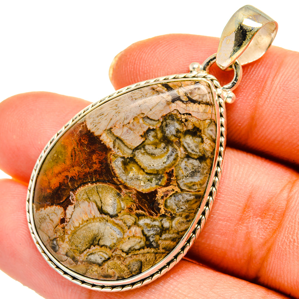 Teardrop pendant bezel with multicolor mushroom rhyolite stone and silver top loop