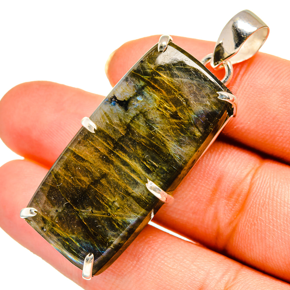 Labradorite gemstone pendant in silver bezel, rectangular green-yellow stone