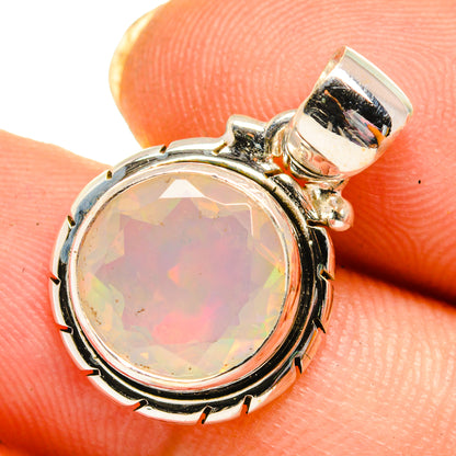 Sterling silver opal pendant with faceted oval opal cabochon bezel setting