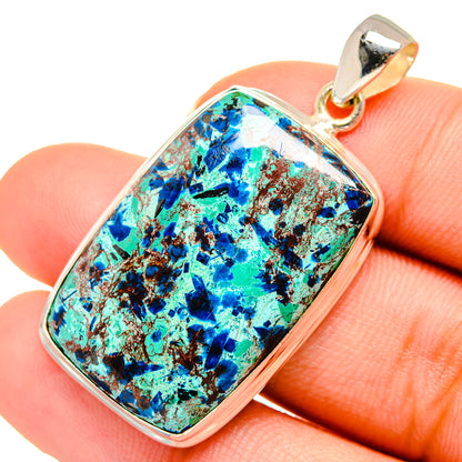 Shattuckite pendant close-up with blue-green matrix stone and polished 925 silver bail