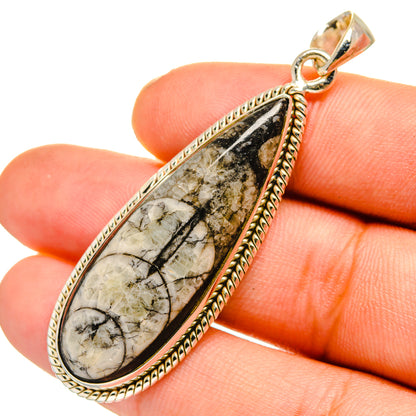 Teardrop fossil stone pendant in 925 sterling silver, beaded frame close-up