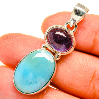 Sterling silver pendant with oval turquoise and purple gemstones and top bail