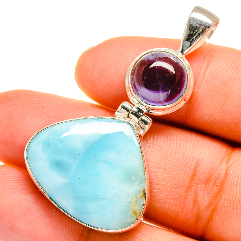 Sterling silver pendant with blue Larimar teardrop and round lavender tanzanite, bail loop