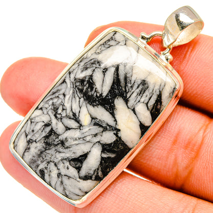 Pinolith jasper pendant in sterling silver with teardrop bezel, white stone with black veining