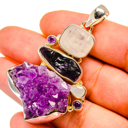 Amethyst crystal pendant with moonstone cabochon and round amethyst accents