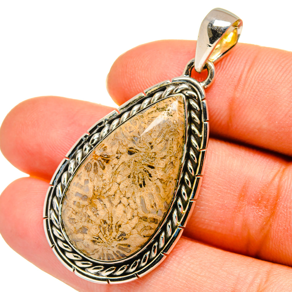 Fossil coral pendant with teardrop stone in ornate 925 sterling silver setting