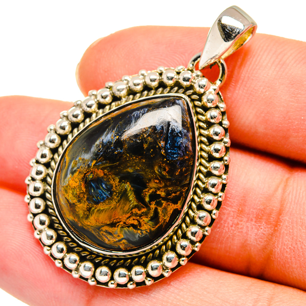 Sterling silver teardrop pendant with oval pietersite cabochon, blue and amber bands