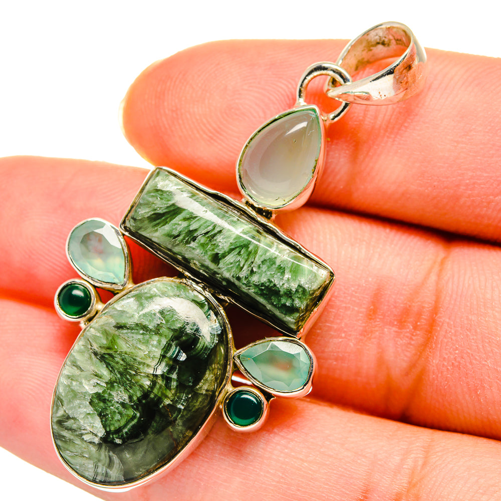 Green gemstone pendant close-up with rectangle and drop stones, gold-tone 925 silver