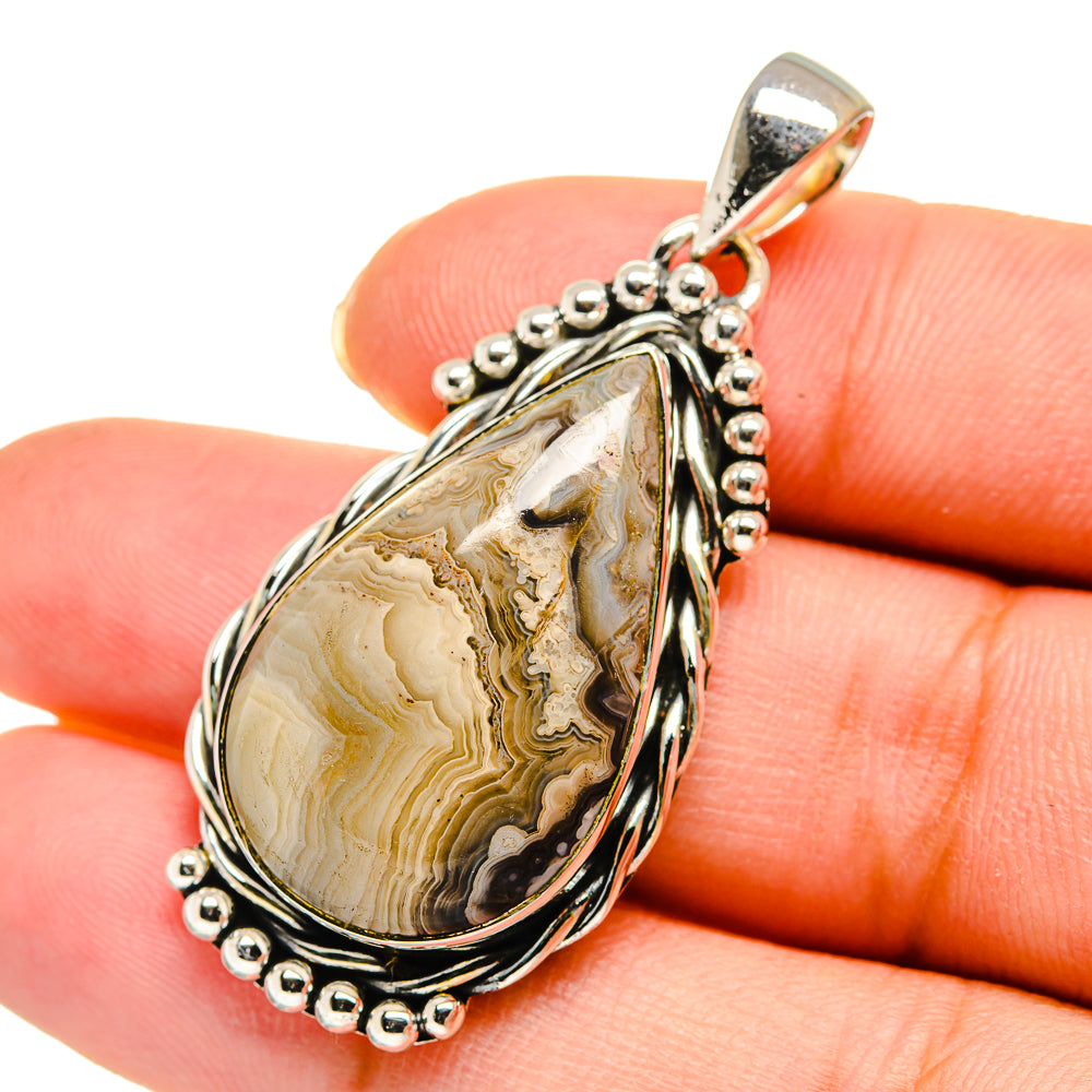 Laguna lace agate pendant in 925 sterling silver, teardrop stone on bead frame