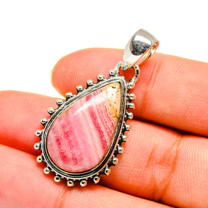 Rhodochrosite teardrop pendant with 925 sterling silver bail, beaded bezel, pink stone