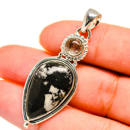 Sterling silver teardrop jasper pendant with black stone and white inclusions, round top bail