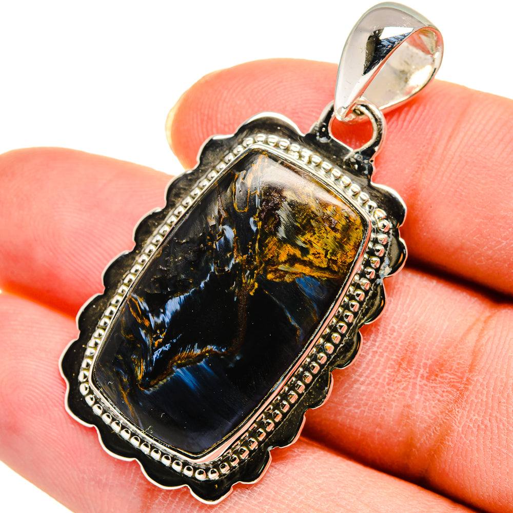 Sterling silver pietersite pendant with bail and textured scalloped frame, blue-gold polished stone