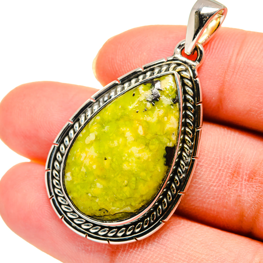 Green opal teardrop pendant with ornate 925 sterling silver frame, close-up detail