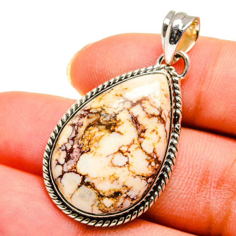 Teardrop gemstone pendant with white and brown Peanut Wood Jasper in sterling silver bezel