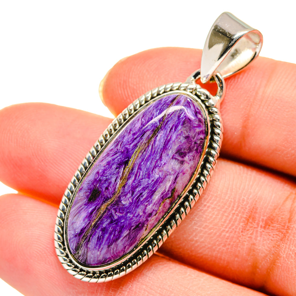 Sterling silver charoite pendant with oval purple cabochon and bail