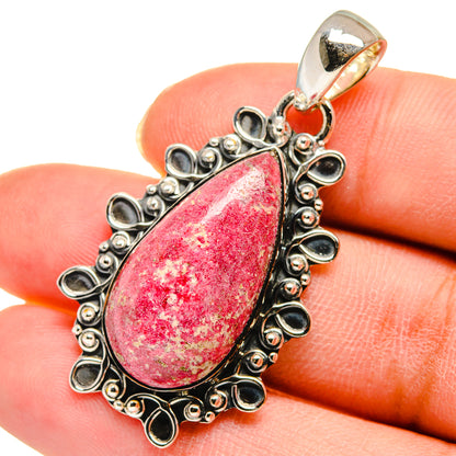 Thulite teardrop pendant in 925 sterling silver, ornate bezel with pink-red stone