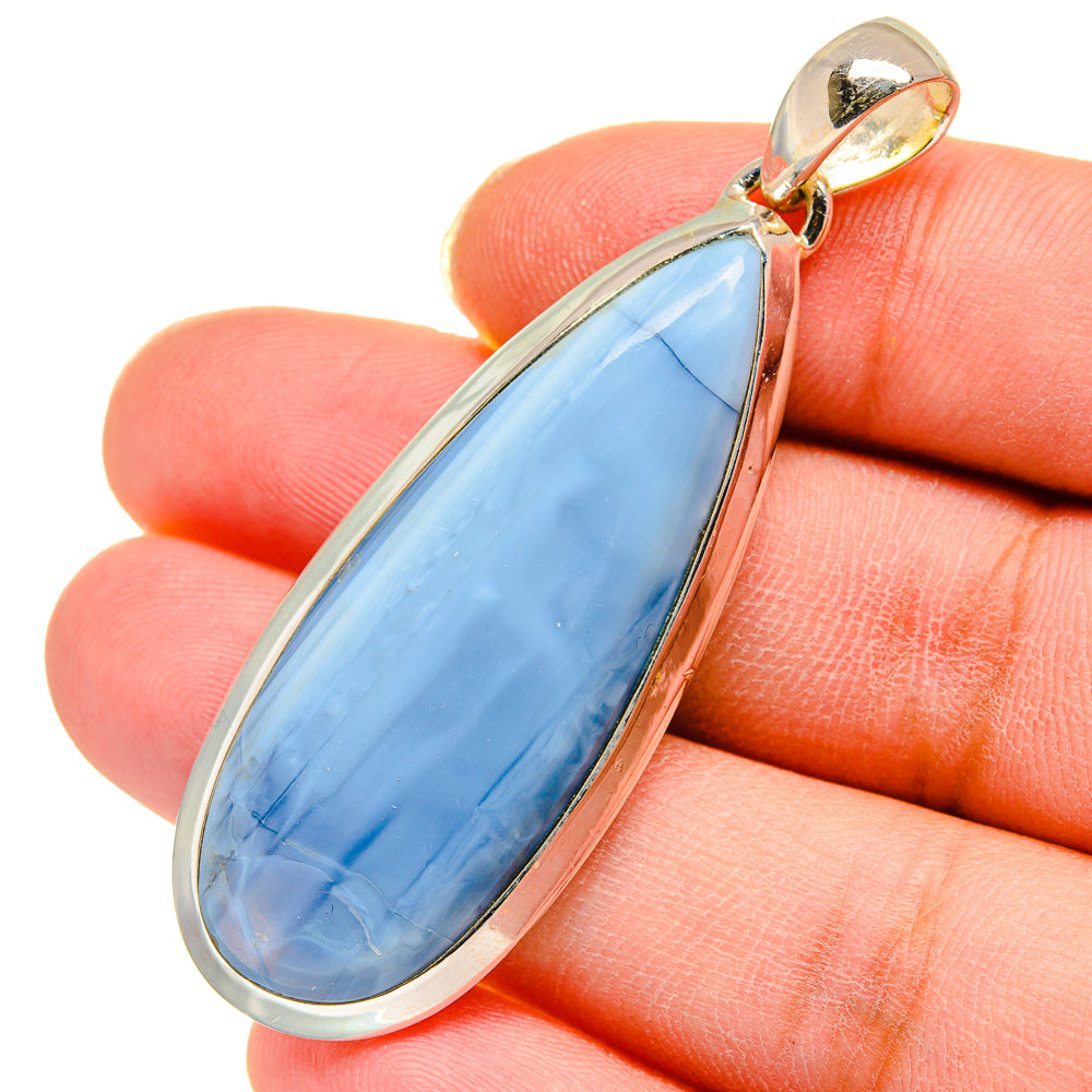 Sterling silver opal pendant, teardrop blue stone in open bezel with bail