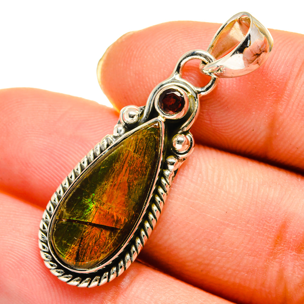 925 sterling silver garnet pendant with teardrop iridescent stone and round garnet detail