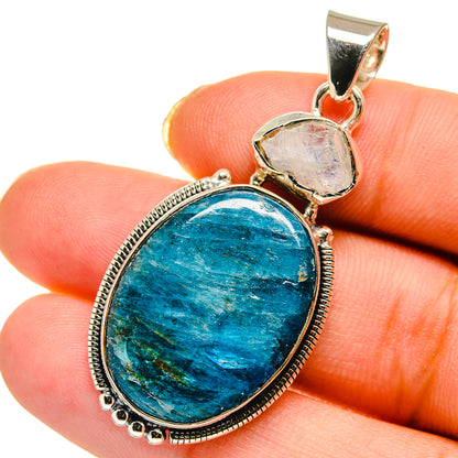 Apatite and moonstone pendant in oval blue stone with silver bezel and top bail