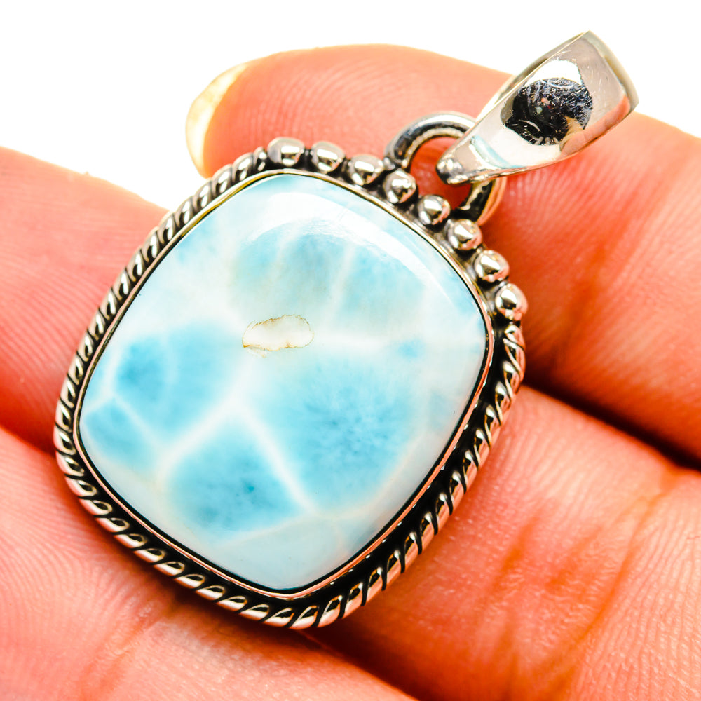 Larimar oval pendant close-up, sterling silver scalloped bezel and bail loop
