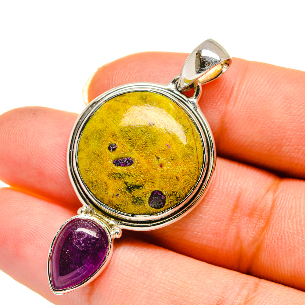Sterling silver pendant with round yellow stone and two teardrop amethyst stones