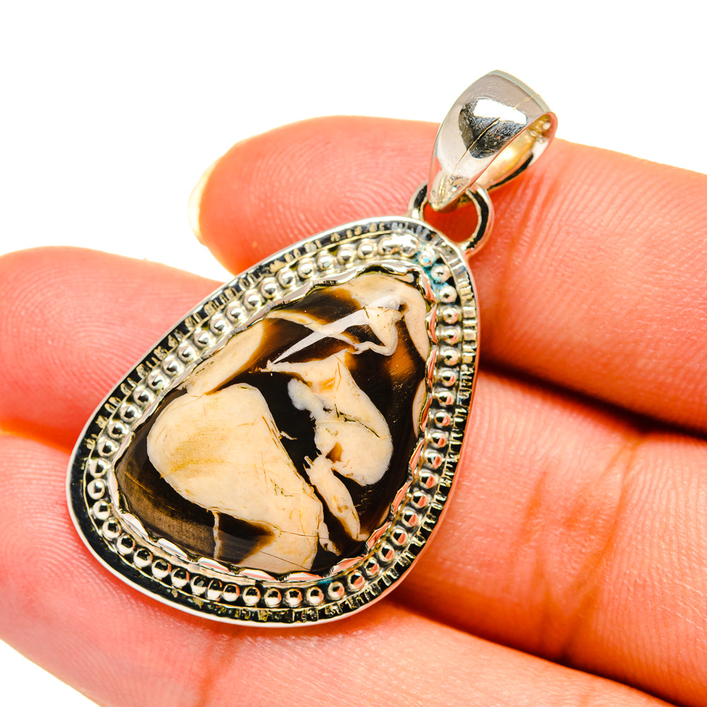 Sterling silver teardrop pendant with bead border and oval jasper cabochon, black and cream.
