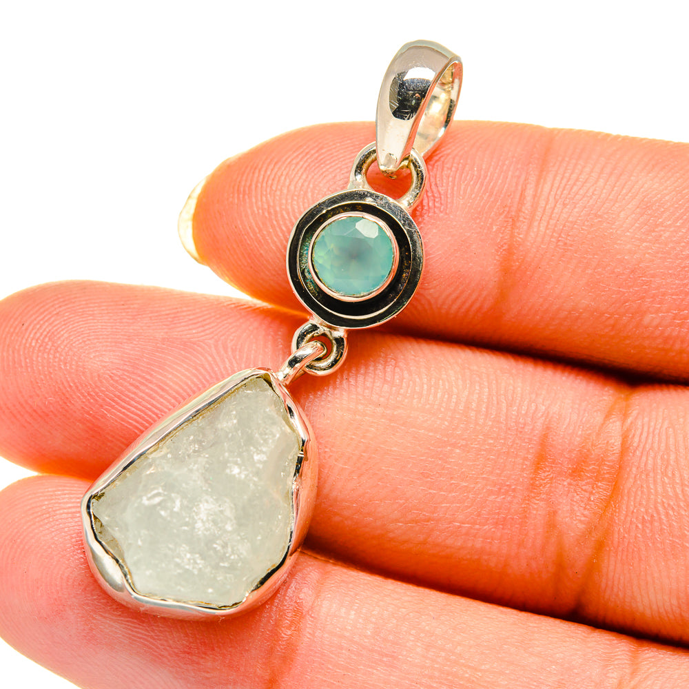 Sterling silver pendant with rough aquamarine drop and round aqua gemstone accent