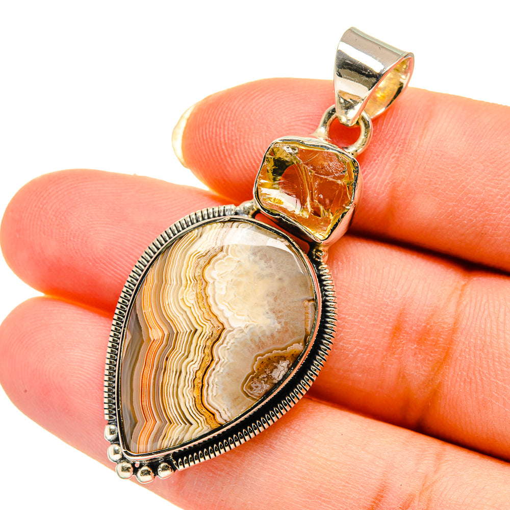 Sterling silver pendant with lace agate pear drop and square citrine top, scalloped bezel