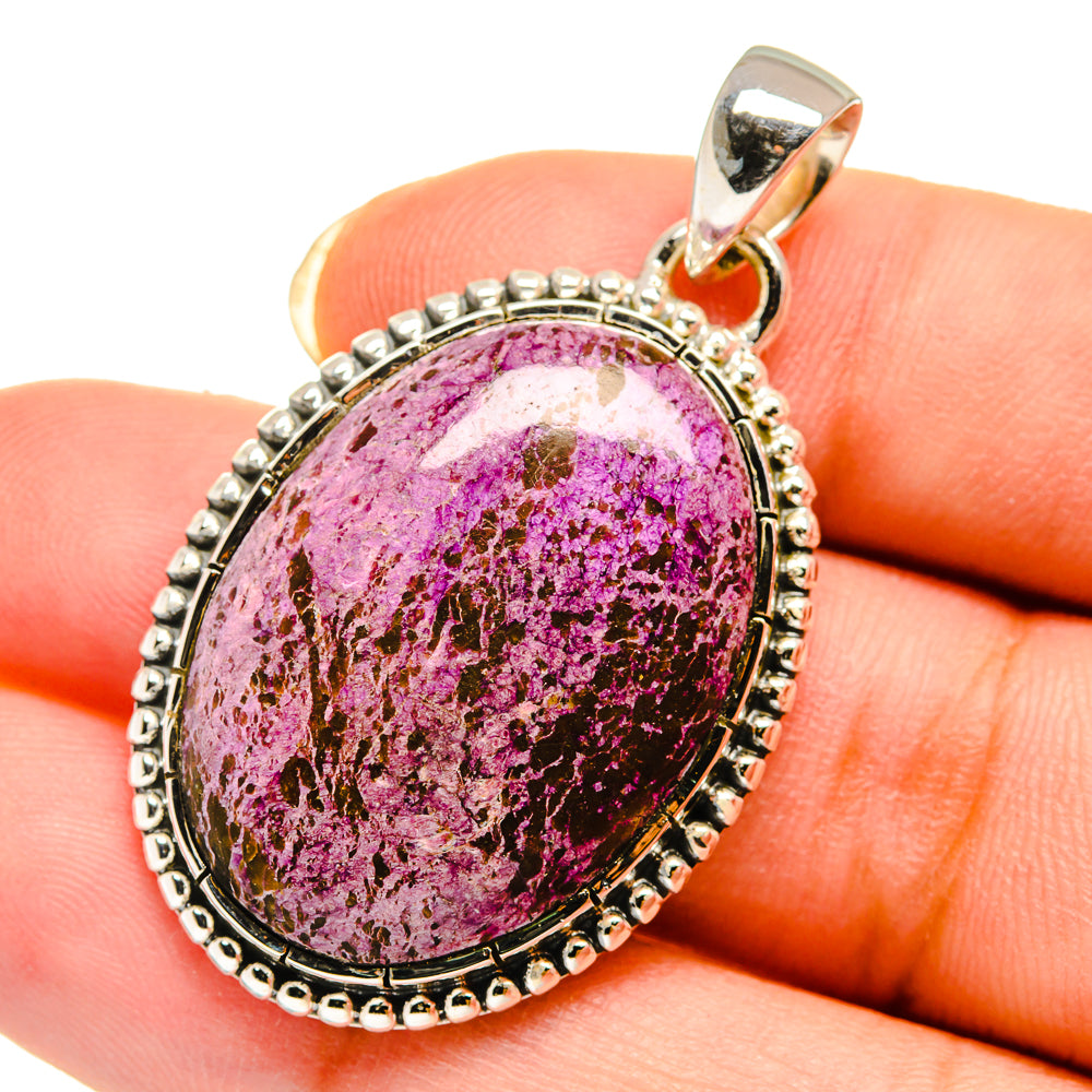 Oval stichtite pendant with magenta speckled stone, silver beaded bezel and bail