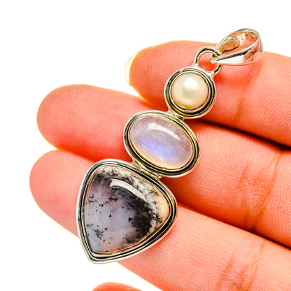 Tri-stone pendant with cultured pearl and two opal cabochons showing iridescent color