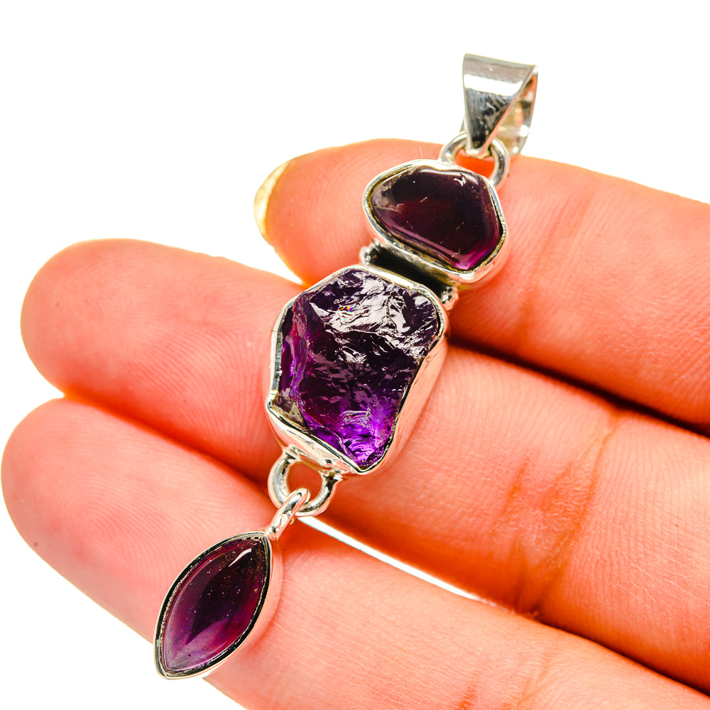 925 sterling silver amethyst pendant close-up with rough purple center and oval drops